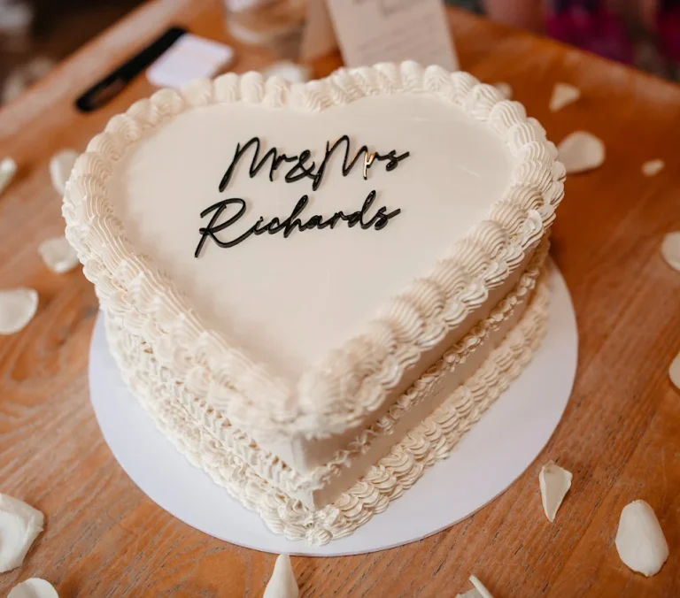 White vintage heart cake, with black acrylic Mr & Mrs sign